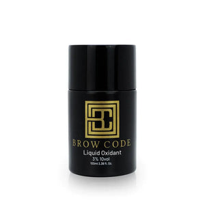 Brow Code Liquid Oxidant 3% 10 Volume developer in a black 100ml bottle with gold logo, professional eyebrow tinting and brow lamination product.