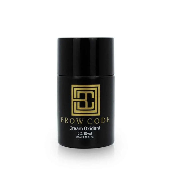 Brow Code Cream Oxidant 3% 10vol in a sleek 100ml black bottle with gold branding, designed for activating hybrid brow dyes
