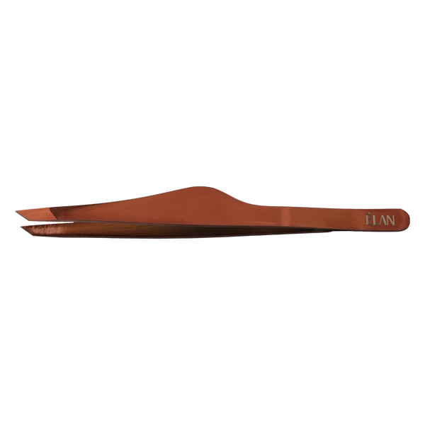 Élan Slant Tip Tweezer in matte copper finish features a precise angled tip designed for expert brow shaping and effortless hair removal