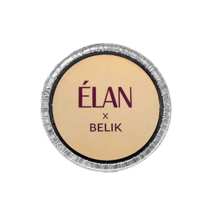Élan x Belik Dense Brow Wax in a round metal container with beige label and burgundy text, designed for professional eyebrow styling and definition.