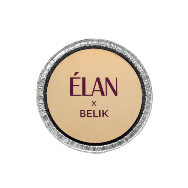 Élan x Belik Dense Brow Wax in a round metal container with beige label and burgundy text, designed for professional eyebrow styling and definition.