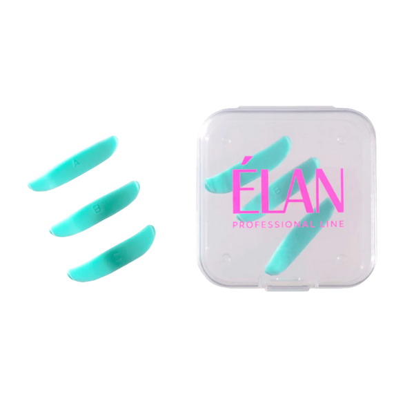Élan Lower Lashes Shields in turquoise, shown with a clear storage case, designed to protect and shape lashes during lamination treatments