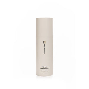 Brow Code Arch Aid Post Wax Renewal Gel in a sleek 200mL beige bottle, designed to soothe and hydrate skin after waxing treatments