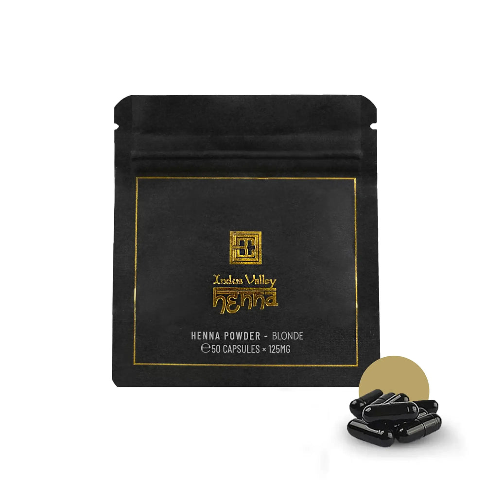 Brow Code Henna Powder in Ash Blonde, a professional-grade brow tint in capsule form, providing long-lasting color for defined eyebrows