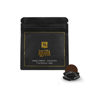 Brow Code Henna Powder in Dark Brown, a professional-grade eyebrow tint in capsules, providing rich, long-lasting color for bold, well-defined brows