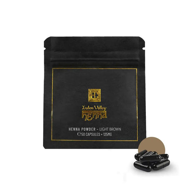 Brow Code Henna Powder in Light Brown, a professional eyebrow tint in capsule form, offering rich, long-lasting color for fuller, defined brows