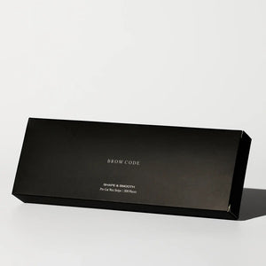 Brow Code Shape & Smooth Pre-Cut Wax Strips in a sleek black rectangular box containing 500 precision strips for eyebrow shaping and waxing
