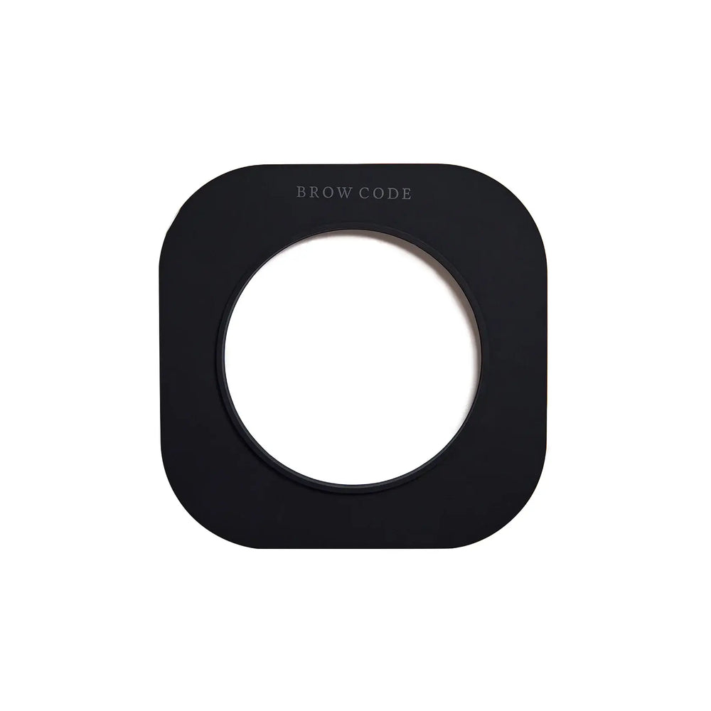 Brow Code Silicone Wax Collar in sleek black, a durable reusable protector designed to fit wax pots and keep them clean during brow treatments