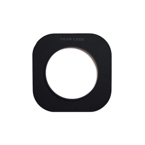 Brow Code Silicone Wax Collar in sleek black, a durable reusable protector designed to fit wax pots and keep them clean during brow treatments