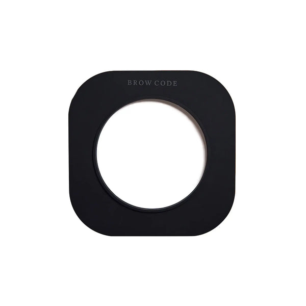 Brow Code Silicone Wax Collar in sleek black, a durable reusable protector designed to fit wax pots and keep them clean during brow treatments