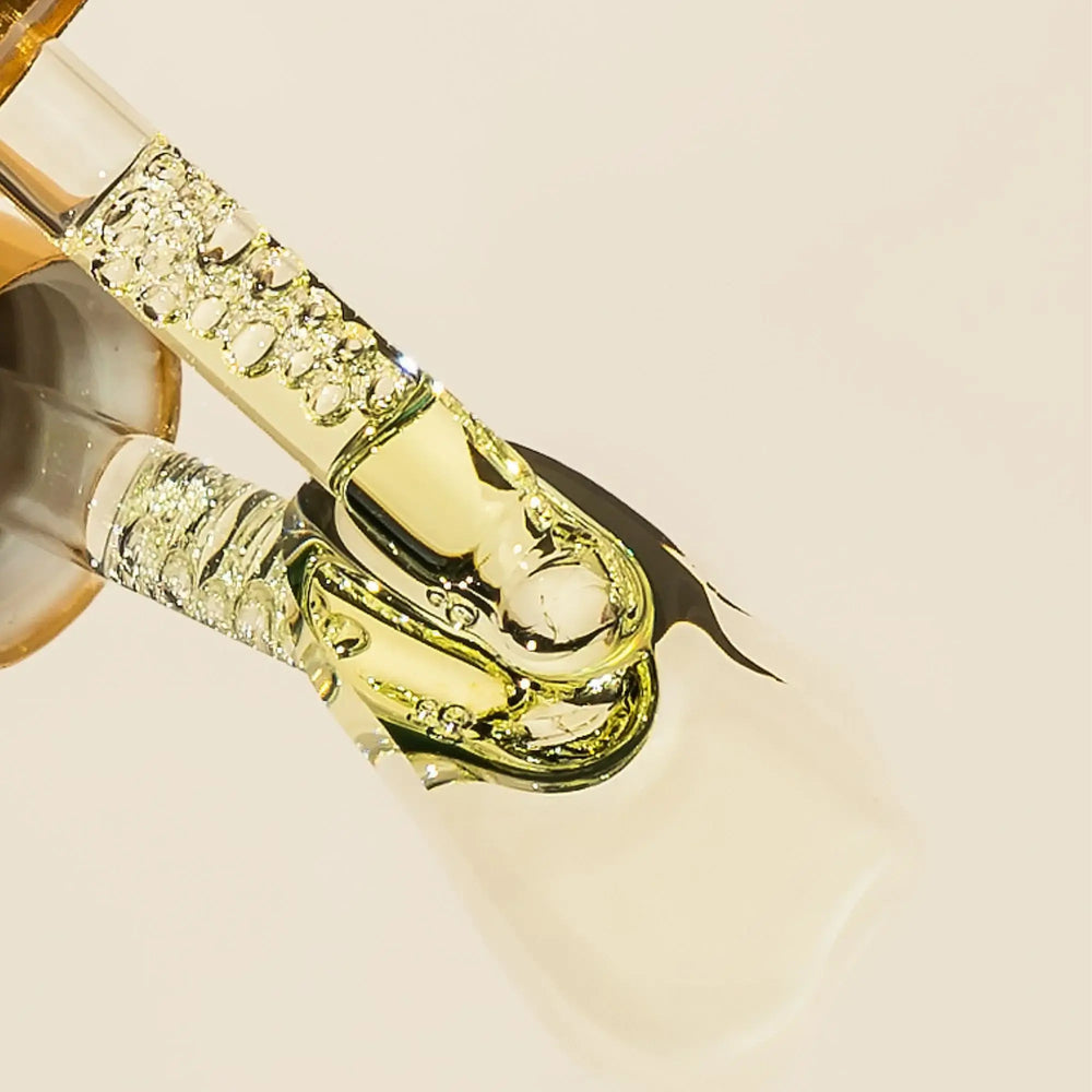 Brow Code Brow Gold Nourishing Growth Oil in a 5ml bottle, enriched with natural ingredients to condition, strengthen, and enhance brow growth