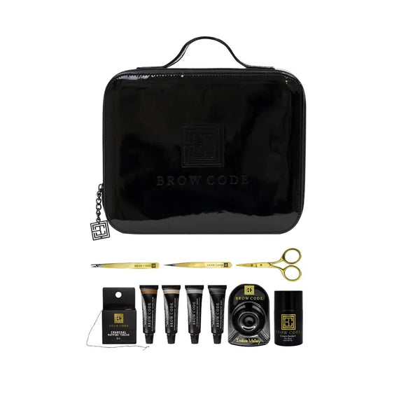Brow Code Professional Brow Tint Kit with black carrying case, precision tools, five brow tint tubes, charcoal mapping thread, mixing dish, and cream oxidant
