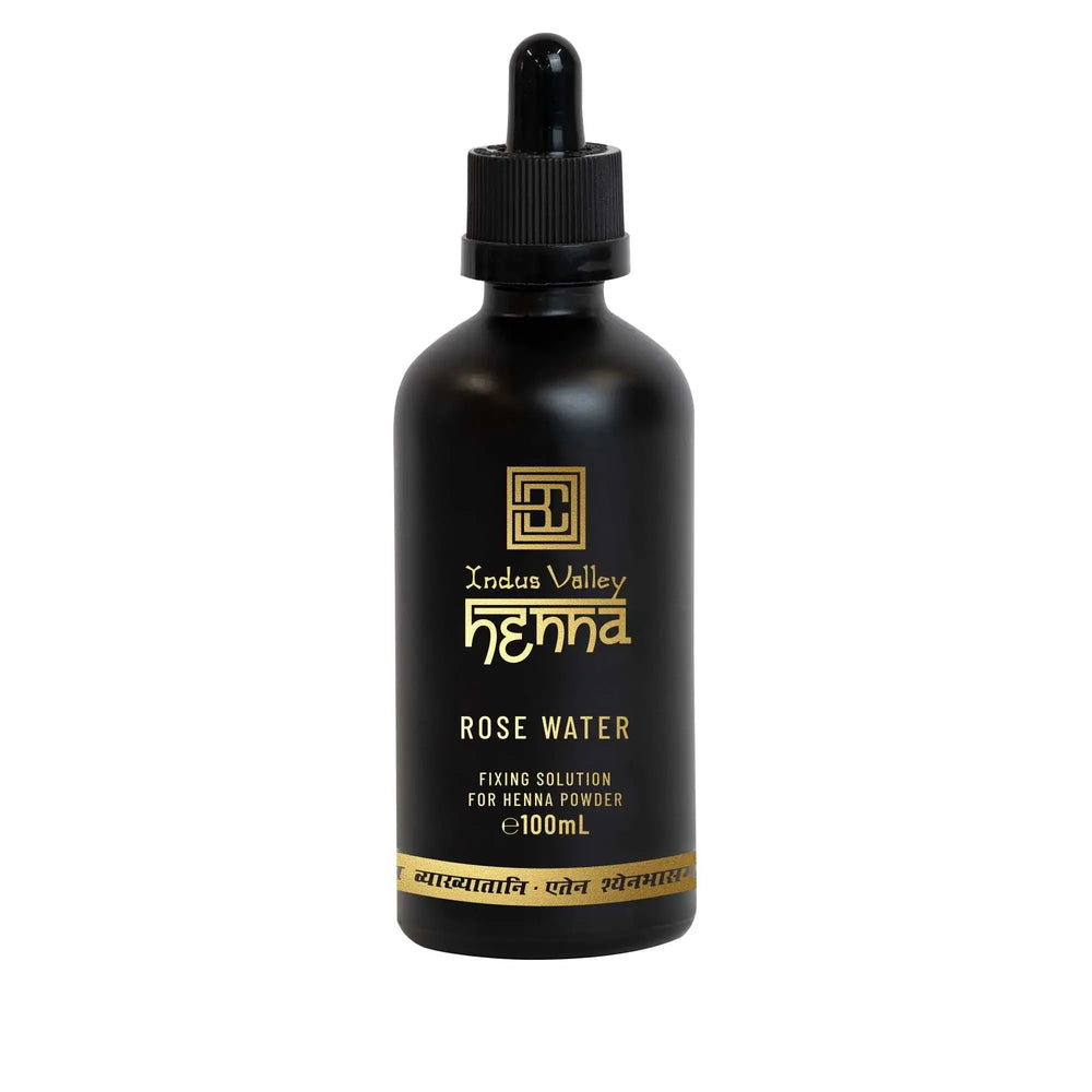 Brow Code Indus Valley Henna Rose Water Fixing Solution in a 100ml matte black bottle with dropper, designed for mixing with henna powder