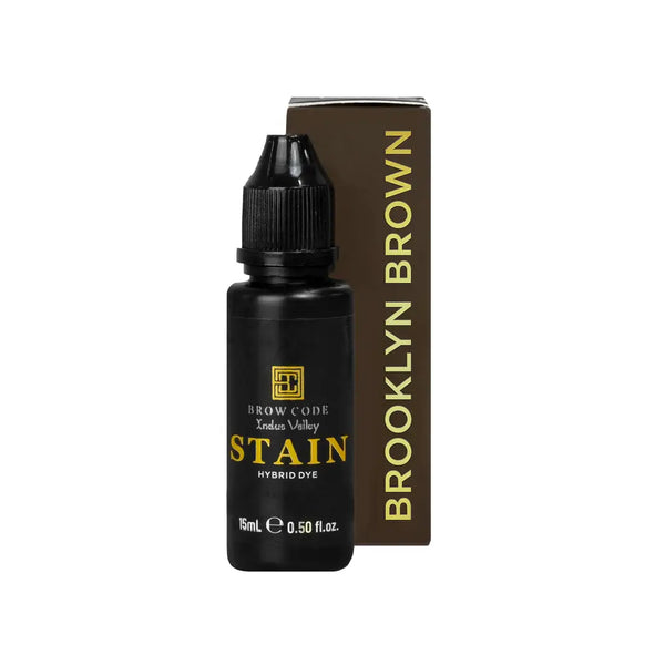 Brow Code Stain Hybrid Dye in Brooklyn Brown shade, featuring a 15ml sleek black bottle paired with a rich brown box for professional brow tinting