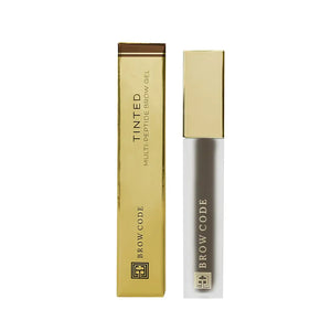 Brow Code Tinted Multi-Peptide Brow Gel in Chocolate with gold packaging, designed to tint, shape, and nourish brows in one application