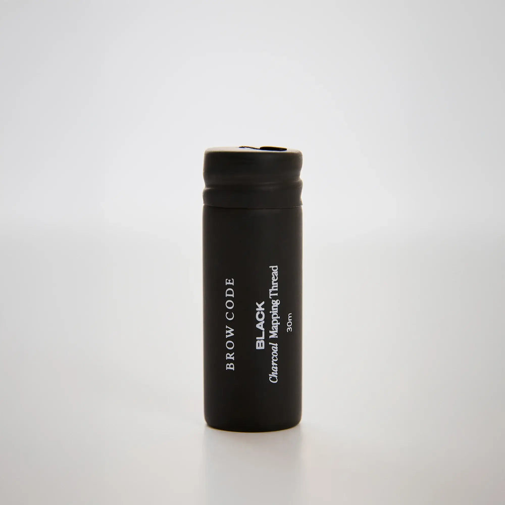 Brow Code Black Charcoal Mapping Thread 30m spool shown upright on white background, ideal for brow symmetry and precise shaping