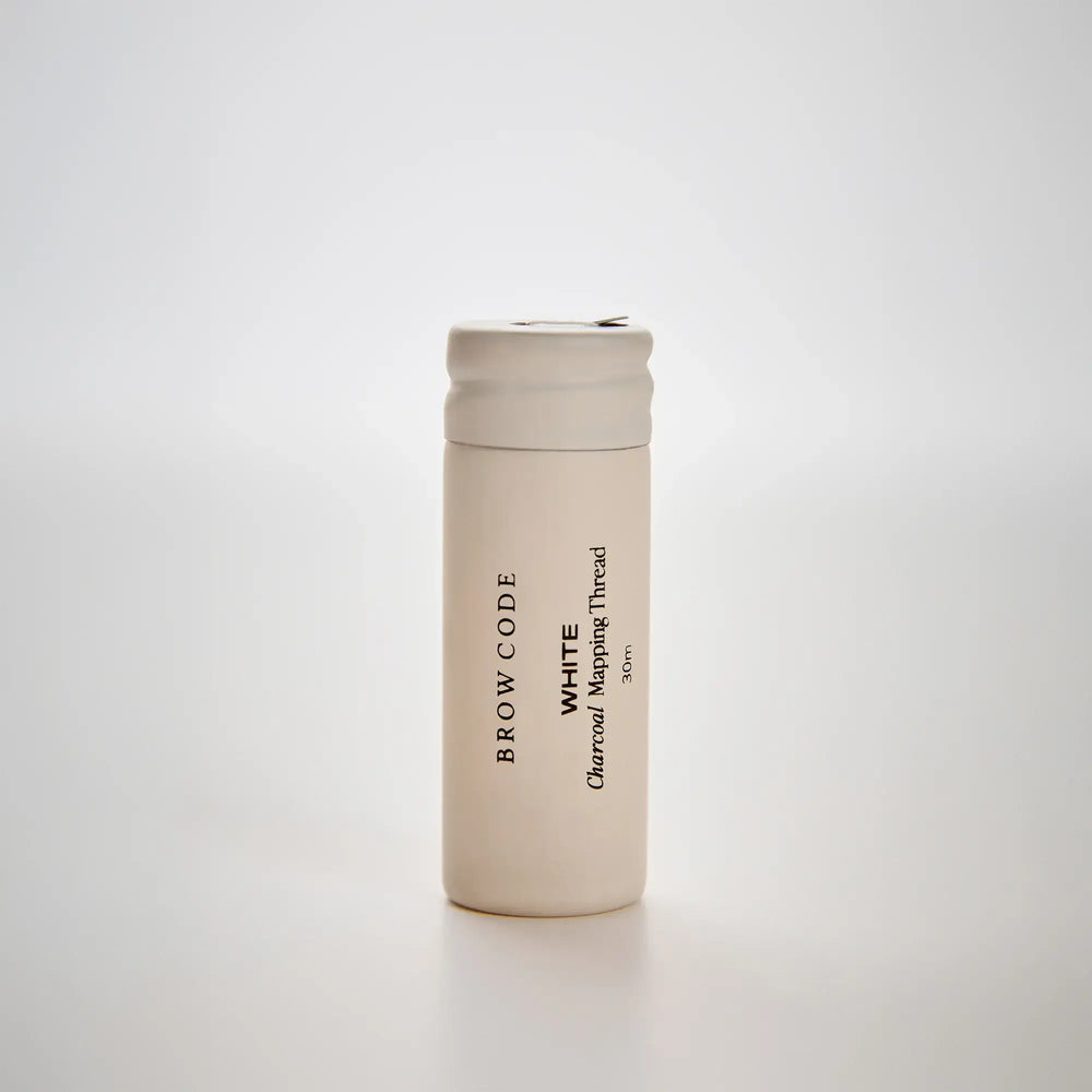 Brow Code Black Charcoal Mapping Thread 30m spool shown upright on white background, ideal for brow symmetry and precise shaping