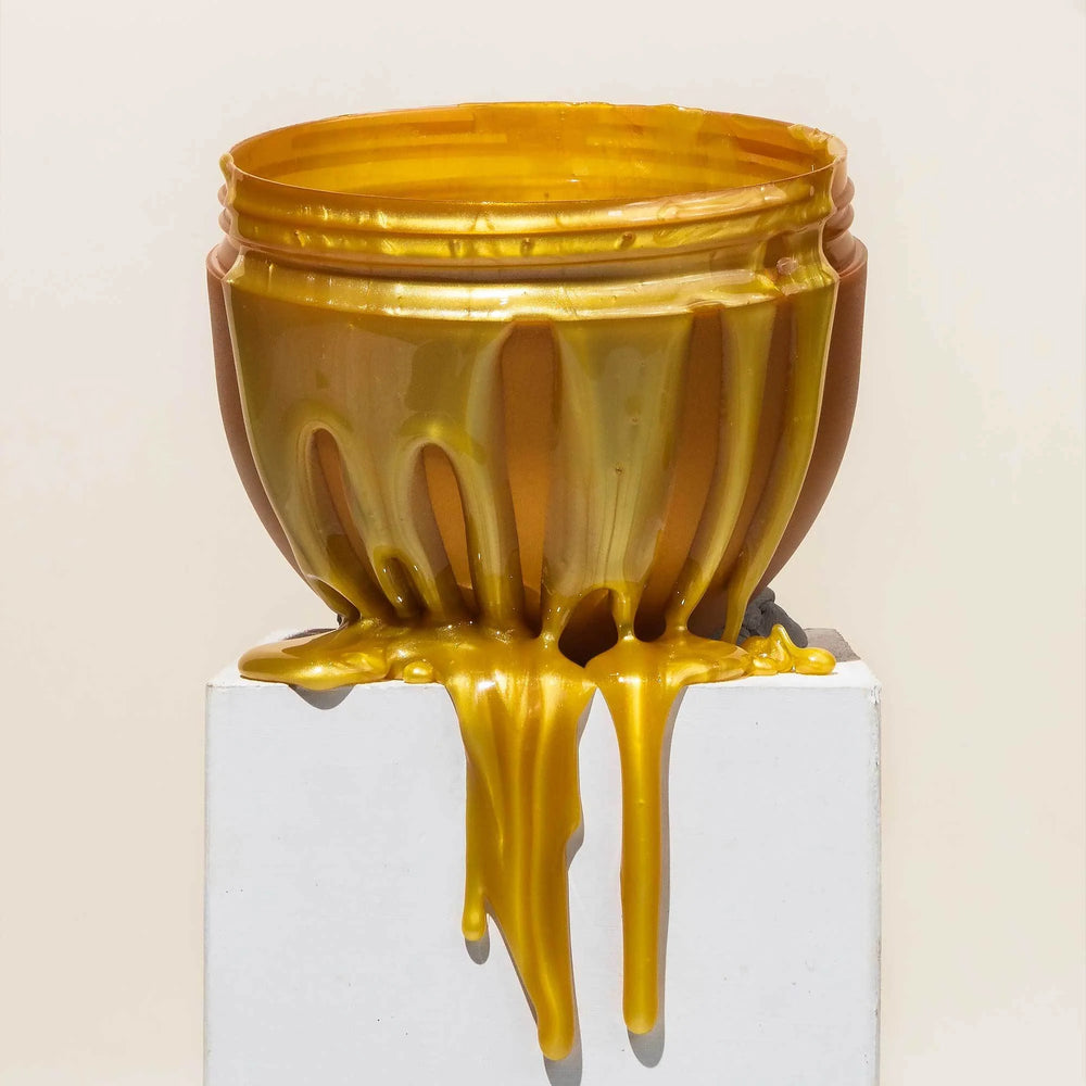 Brow Code Design & Define Microwavable Brow Styling Hot Wax in open gold jar with cherry blossom scent, 250g container