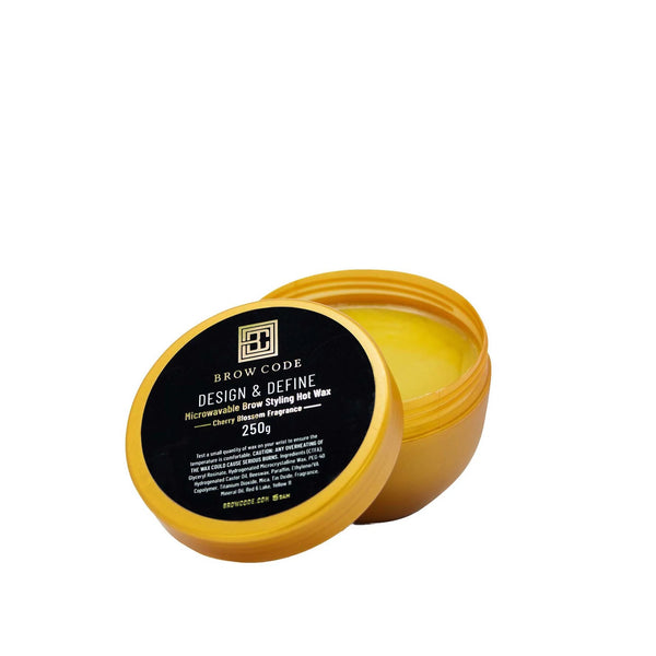 Brow Code Design & Define Microwavable Brow Styling Hot Wax in open gold jar with cherry blossom scent, 250g container