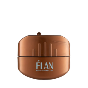 ÉLAN Professional Line cosmetic pencil sharpener in metallic bronze with compact, rounded design and built-in blade cover