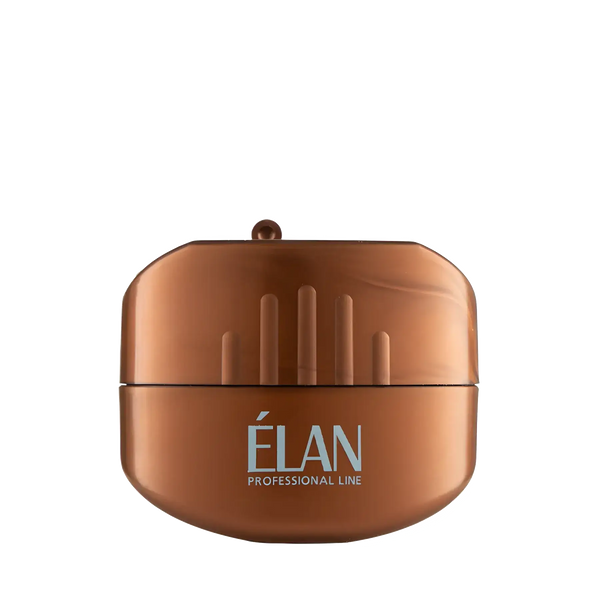 ÉLAN Professional Line cosmetic pencil sharpener in metallic bronze with compact, rounded design and built-in blade cover