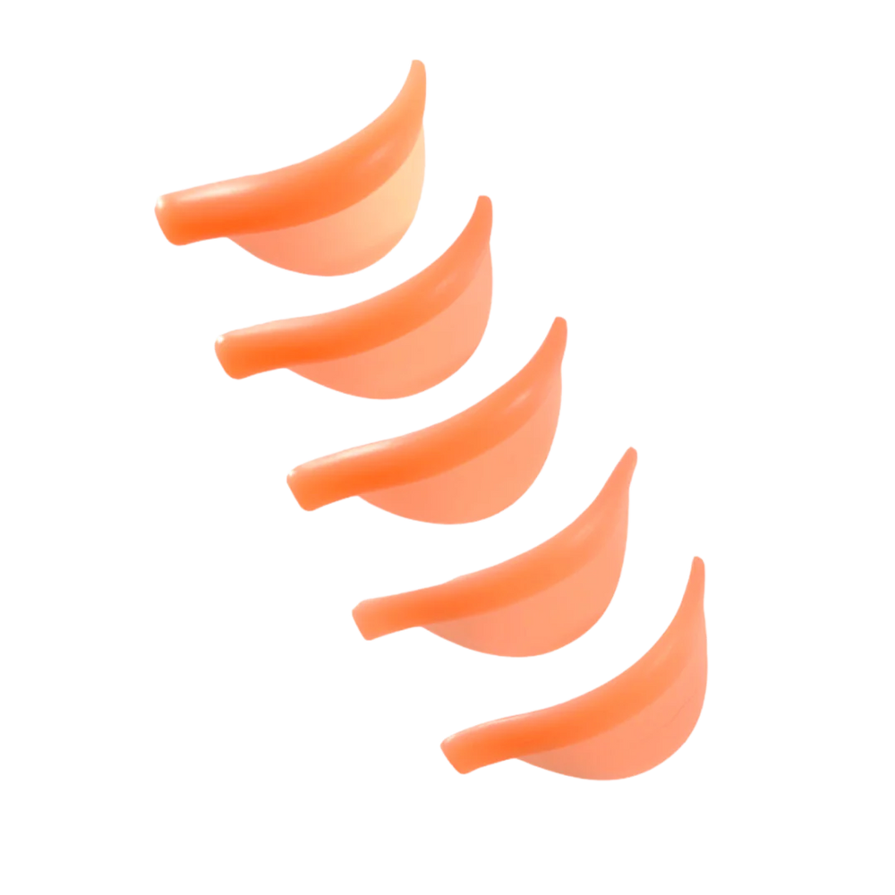 Soft orange ÉLAN lash lift shields shown with two samples and a full set inside a transparent case, ideal for creating precise lash curls during lamination