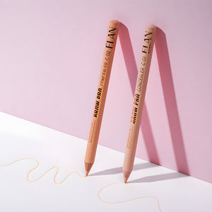 ÉLAN Brow Pro Concealer Pencils in shades C01 and C02 on a pink background, with pencil lines showing creamy texture for brow sculpting.