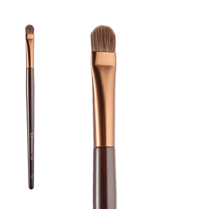 ÉLAN Professional Brush Face No.12 featuring a flat, densely packed synthetic bristle head, ideal for blending cream and powder products with precision.