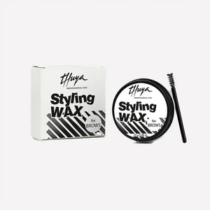 Thuya Professional Brow Styling Wax set featuring a black and white tin, matching box, and spoolie brush for shaping and setting eyebrows