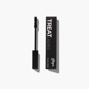 Thuya Treat Lashes Mascara with lash growth treatment formula, shown with black packaging and classic applicator wand for nourished, defined lashes.