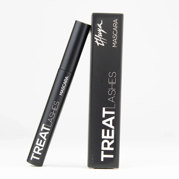 Thuya Treat Lashes Mascara with lash growth treatment, featuring sleek matte black tube and matching box for professional lash enhancement.