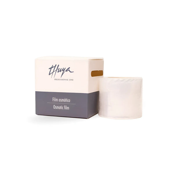 Thuya Osmotic Film roll in dispenser box, designed for professional brow and lash treatments to enhance product absorption and processing.