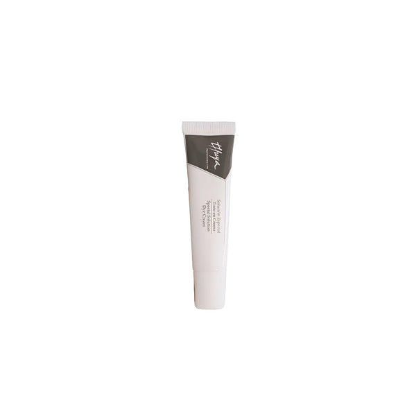 Thuya Special Solution Dye Cream in a small white and grey tube, ideal for precise eyebrow and eyelash tinting treatments in professional salons.